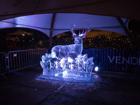 Jelgava / Latvia - February 10th, 2017: White lighted deer ice sculpture at night of International Ice Sculpture Festival in Jelgava.のeditorial素材