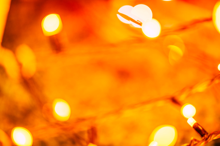 Blurred colorful Christmas Lights and New year Decoration Background - Yellow Colorの写真素材