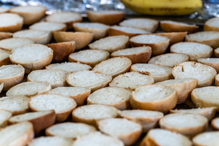 Sliced Bread Spread on a Table for Small Burgers - Kitchen Setの写真素材