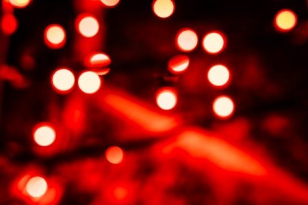 Blurred colorful Christmas Lights and New year Decoration Background - Red Colorの写真素材