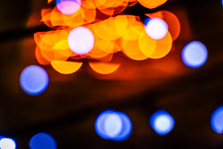 Blurred colorful Christmas Lights and New year Decoration Background - Yellow Colorの写真素材