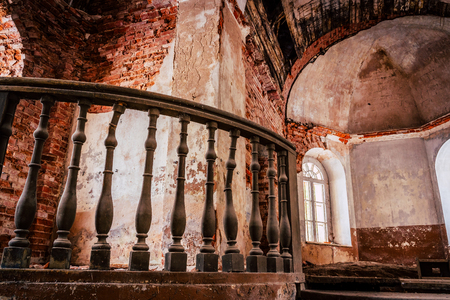 Inside Interior of an old Abandoned Church in Latvia, Galgauska - light Shining Through the Windows, Colorful Brown Themeの写真素材
