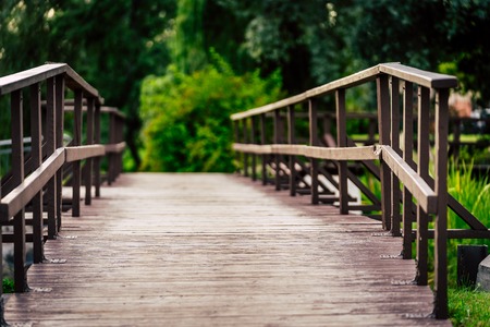 Colorful Photo of the Wooden Bridge in a Park, Between Woods - Colorful, Space for Text, Autumn Dayの写真素材