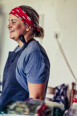 Female Chef Taking a Break from Meal Preparation - Happy, Smiling, Concept of a Hard Working Person, Vintage Film Lookの写真素材