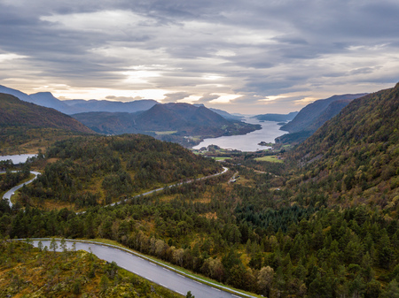 Drone Photo of the Road Leading to Fjord in GammellÃ¥ven with a Dramatic Sky in Background - Concept of Travel and Harmonyの写真素材