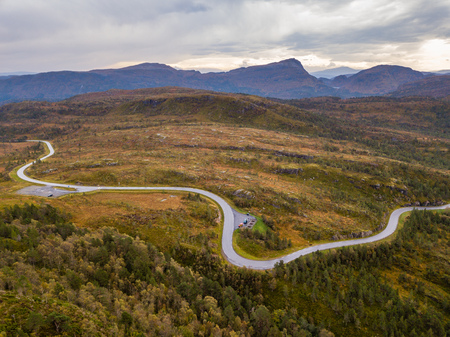 Drone Photo of the Road Leading to Fjord in Gammellaven with a Dramatic Sky in Background - Concept of Travel and Harmonyの写真素材