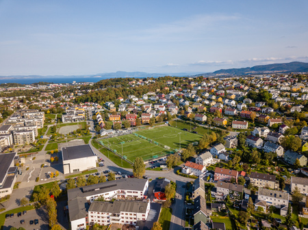 Drone Photo of the City Trondheim in Norway on Sunny Summer Day with Mountains, Fjord and Port in the Background - Concept of Travel and Harmonyの写真素材