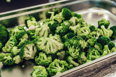 Prepared Broccoli in Plastic Container for Wedding Meal - Kitchen Set, Vintage Film Lookの写真素材