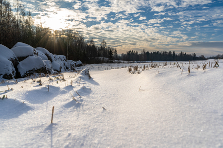 Empty Countryside Landscape in Sunny Winter Day with Snow Covering the Ground, Abstract Background with Deep Look - Concept of Fun and Joyの写真素材