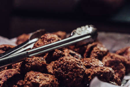 Baked Round Pork Cutlets Spread out on Baking Paper for Meal - Kitchen Set, vintage lookの写真素材