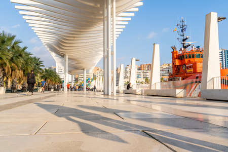 Malaga / Spain - May 18th, 2020: Tourists Walking Under Palmeral de las Sorpresas Architecture Landmarkのeditorial素材
