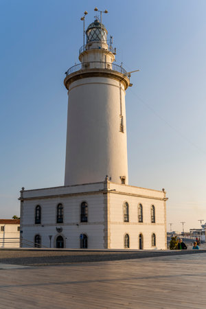 Malaga, Spain 10th of January, 2020:La Farola de MÃ¡laga Lighthouse on Sunny Summer Eveningのeditorial素材