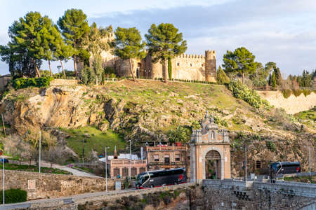 Toledo / Spain - January 23rd, 2020: Tourist Buses Arriving at Castillo San Servando castle in Background, Toledo, Spainのeditorial素材