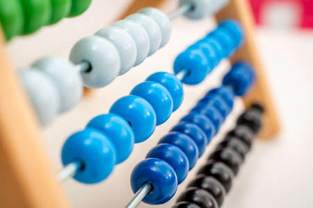 Colorful Abacus Close Up, Concept of Finances and Business. Arithmetical and Mathematical Game Toyの写真素材
