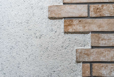 Tiles on Wall like Bricks, Background Texture Pattern with Copy Space - Concept of Renovation and Repairsの写真素材