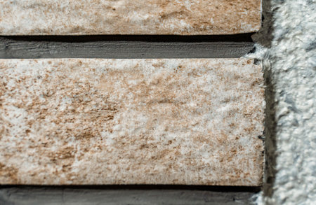 Tiles on Wall like Bricks, Background Texture Pattern with Copy Space - Concept of Renovation and Repairsの写真素材