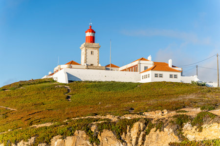 Lighthouse at Cabo da Roca in Portugal. The Westernmost Point of Europe in Golden Hour Sunlightの写真素材
