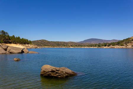 Landscape of a lake or swamp with reflections in the water. Ãvila, Spain.の写真素材