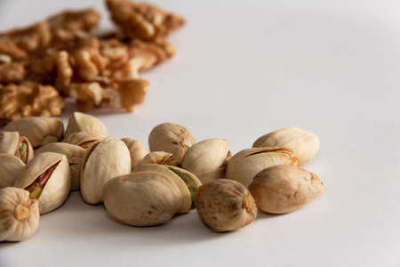 Banner with walnuts and peanuts. Copy space. Selective focus.の写真素材