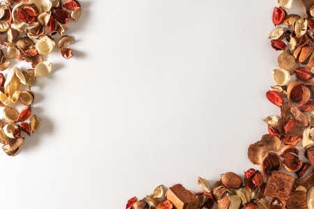 Background of fruits and dry autumn leaves. Copy space. Selective focus.