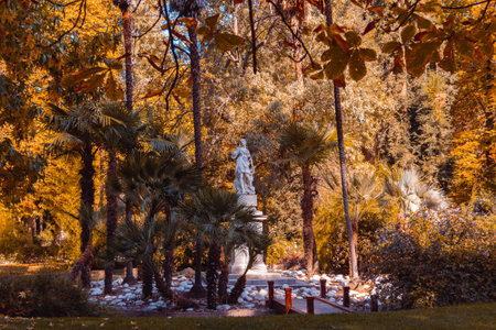 Madrid, Spain; October 18, 2021: Hidden statues in the Retiro Park in Madrid. Selective focus.のeditorial素材