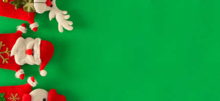 Santa Claus, reindeer and snowman. Christmas decoration. Copy space. Selective focus.