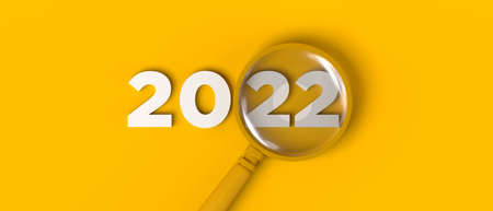 Magnifying glass focusing on the year 2022. Copy space. 3D illustration.