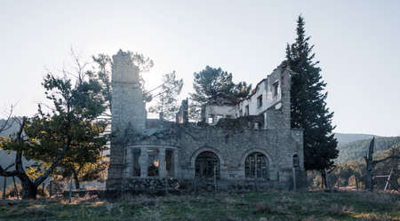 Abandoned and demolished old stone building. Selective focus. Copy space.の写真素材
