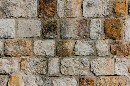 Stone-wall texture. Selective focus. Copyspace.