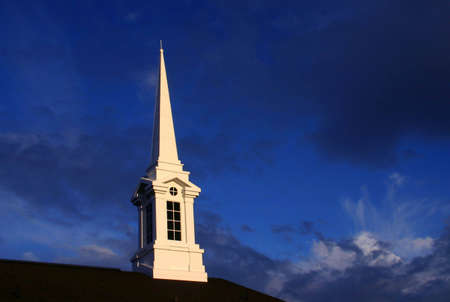 Church steeple at sunsetの写真素材