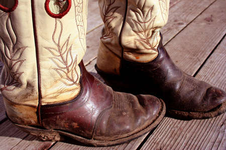 Muddy Cowboy Bootsの写真素材