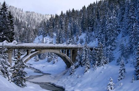 Historic bridge crossing the Payette River in central Idaho, winterの写真素材