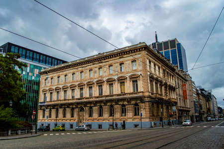 Brussels, Belgium - July 13, 2019: Street with a few cars and people in Brussels, the capital of Belgiumの写真素材