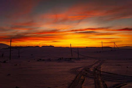 Beautiful sunset in the north of Armenia in winterの写真素材