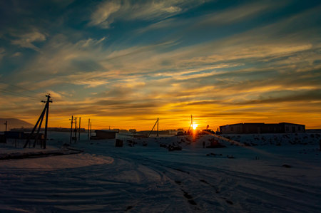 Beautiful winter sunset in the village of Ashots in Armeniaの写真素材