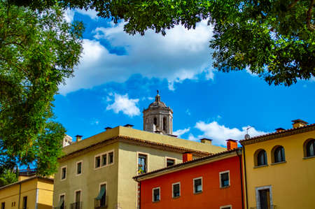Girona, Spain - July 28, 2019: Colorful houses with small windows in the city of Girona in Spainのeditorial素材