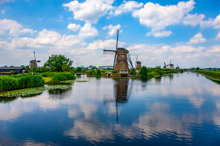 Kinderdijk, Netherlands - June 22, 2019: Traditional Dutch windmills at Kinderdijk. Scenic view of rural Netherlands.の写真素材