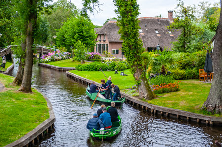 Giethoorn, Netherlands - July 6, 2019: Giethoorn, a scenic village with waterways and canals in the Netherlandsのeditorial素材