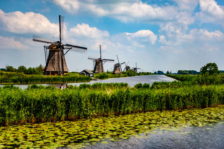 Kinderdijk, Netherlands - June 22, 2019: Dutch canals and windmills at Kinderdijk, a UNESCO world heritage site in the Netherlandsのeditorial素材