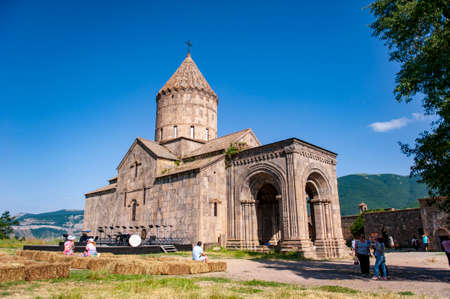 Tatev, Armenia - July 6, 2018: Tourists in the yard of the Saints Paul and Peter cathedral of Tatev monastery in Armeniaのeditorial素材