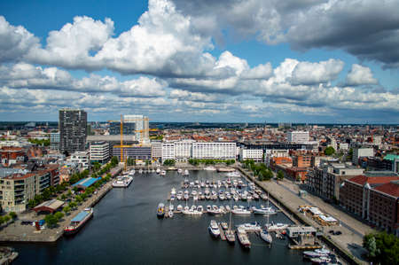Antwerp, Belgium - July 12, 2019: Aerial view of Antwerp, Belgium, on a sunny summer day with beatiful clouds above the harbor.のeditorial素材