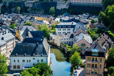 Luxembourg city, Luxembout - July 16, 2019: Aerial view of Alzette river and typical old houses in Old Town of Luxembourg cityのeditorial素材