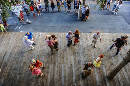 Paris, France - July 20, 2019: Couples dancing tango in public in Paris, Franceのeditorial素材