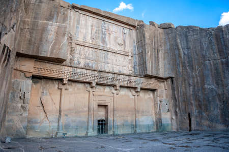 Closeup of the entrance to the tomb of Artaxerxes II in the ruins of Persepolis, ancient ceremonial capital of Persia, located near Shiraz in Iranの写真素材
