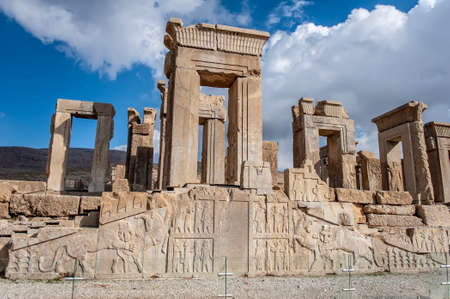 Ruins of the ornate Tachara palace of the ancient ceremonian capital of the Persian empire Persepolis near Shiraz, Iranの写真素材
