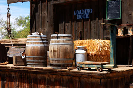 Old western railroad loading dock with many rustic items of interest.の写真素材