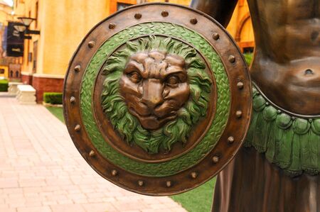 A warior's shield with the Roman insignia - the lion' s head. の写真素材
