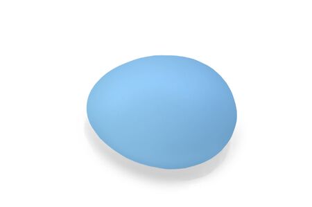 Single Easter egg with shell dyed blue over white.の写真素材