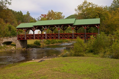 Covered Bridge over a flowing mountain stream in the Smoky Mountains near Teleco Plains, North Carolinaの写真素材