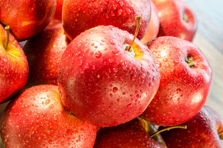 Dew drops on the surface of sweet applesの写真素材